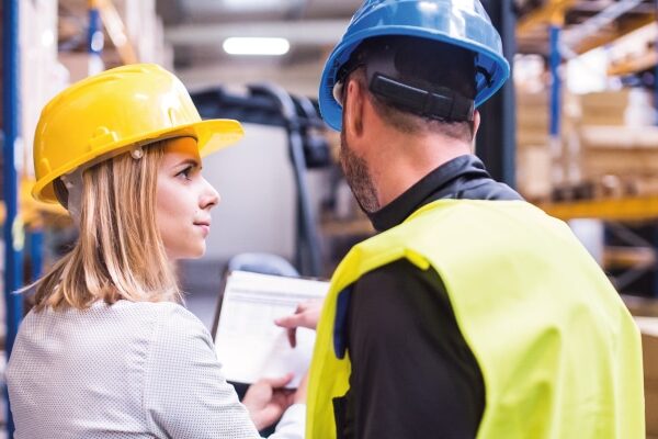 Health & safety manager discussing rules to an employee