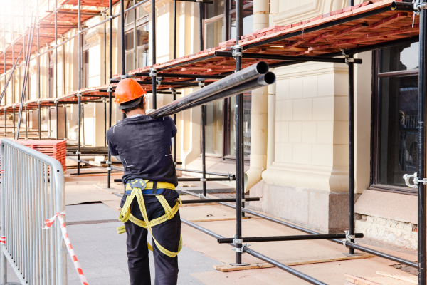 Construction worker with a scaffolding nvq