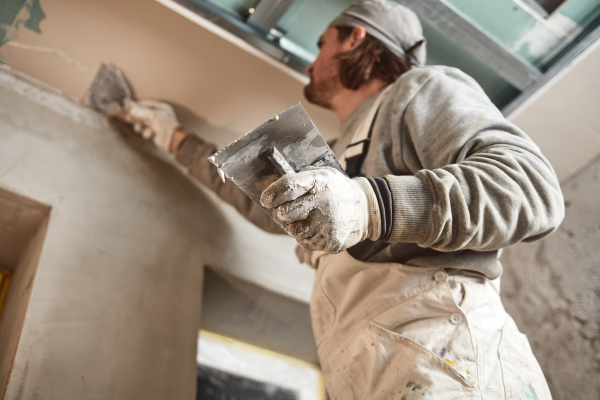 Plasterer on a construction site