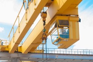 gantry crane operator on active construction site 